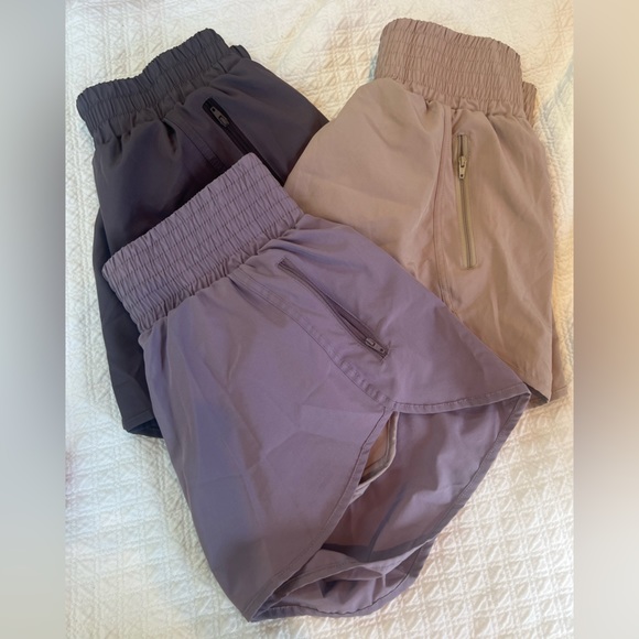 Three Pairs Bundle of Becca Size Small lined silky shorts with zip pocket. 💜🤎 - Picture 1 of 8